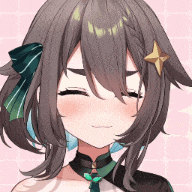 a close up of a girl 's face with her eyes closed and a star on her hair .