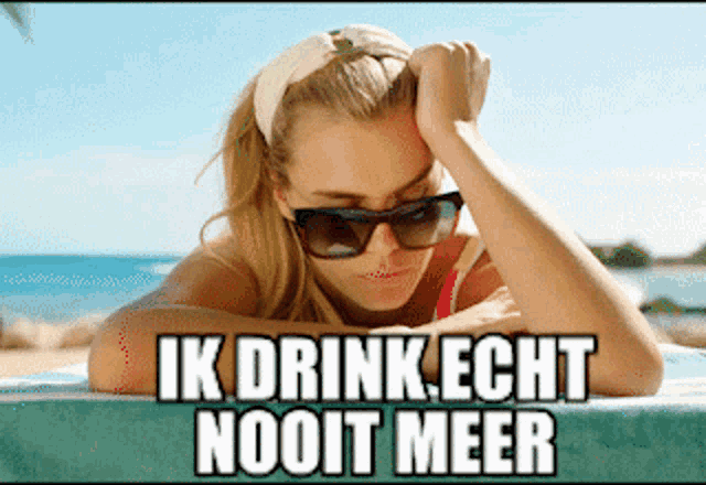 a woman wearing sunglasses and a headband is laying on a beach with the words ik drink echt nooit meer written below her