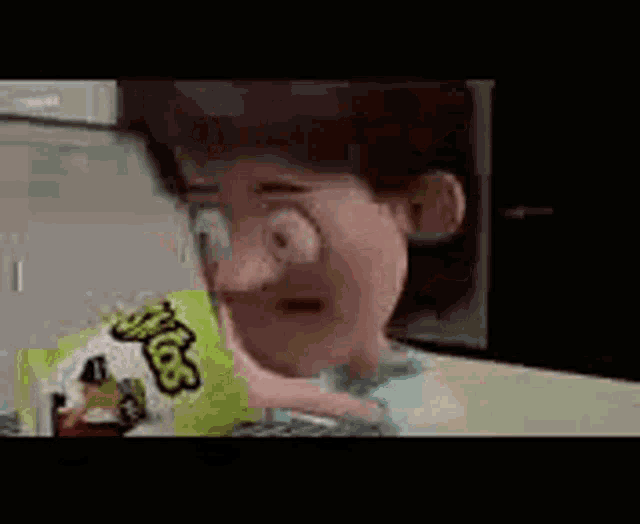 a cartoon character is eating a bag of fritos .