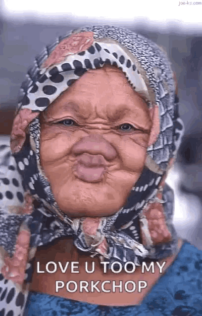 an older woman wearing a scarf around her head is making a funny face .