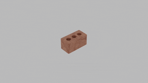 a brown wooden block with three holes in it