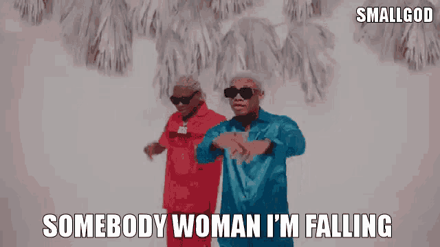 a man and a woman are dancing together in a video .