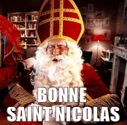 a man dressed as santa claus with the words bonne saint nicolas on the bottom