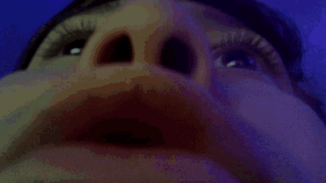 a close up of a person 's mouth with their mouth open