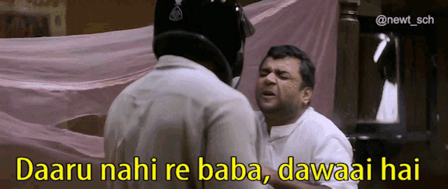 a man wearing a helmet stands next to another man with the caption " daaru nahi re baba dawai hai "