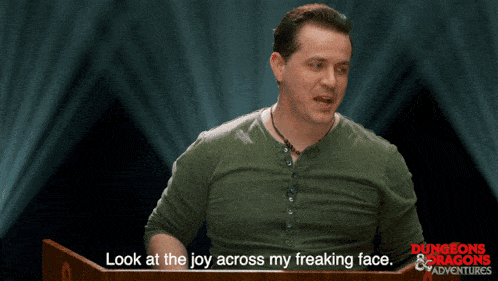a man stands at a podium with the words look at the joy across my freaking face below him