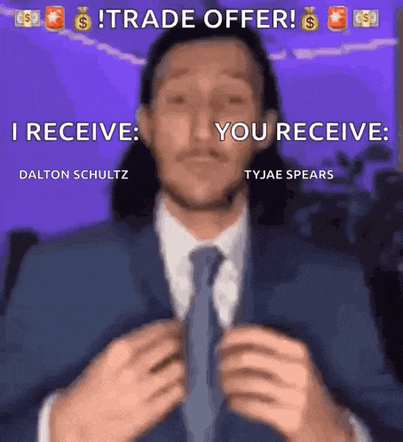 a man in a suit and tie is saying trade offer