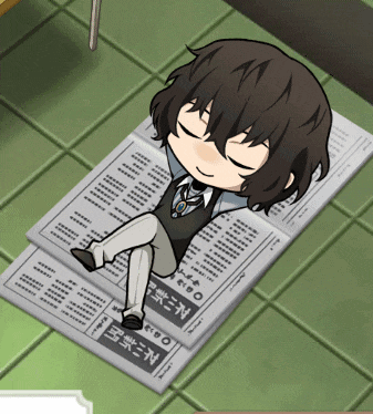a person laying on top of a newspaper with chinese writing
