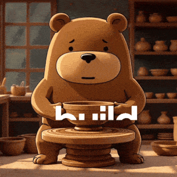 a brown teddy bear is sitting on a pottery wheel