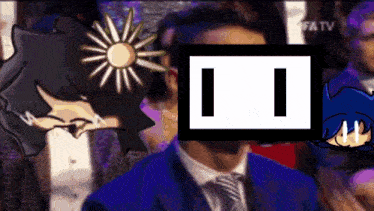 a man in a suit and tie is standing in front of a screen that says ii .