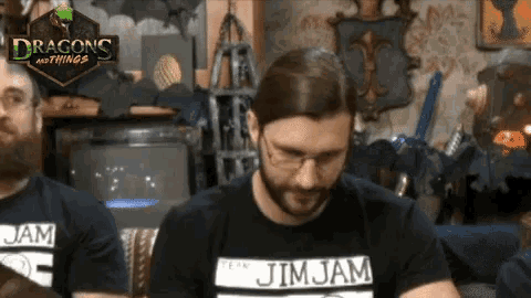 a man wearing a black shirt with jim jam on it
