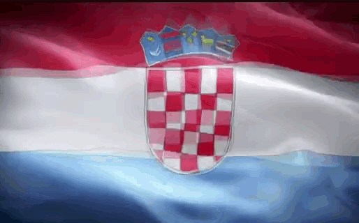 a red white and blue flag with a coat of arms in the middle