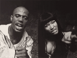 a black and white photo of a man and a woman .