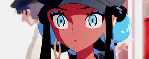 a close up of a cartoon character with blue eyes and earrings