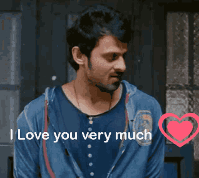 a man in a blue shirt with the words " i love you very much " next to him