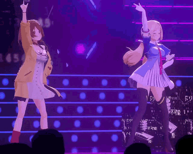 two anime girls are dancing on a stage with a sign that says ' a ' on it