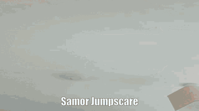 a close up of a person 's face with the words samor jumpscare written on the bottom