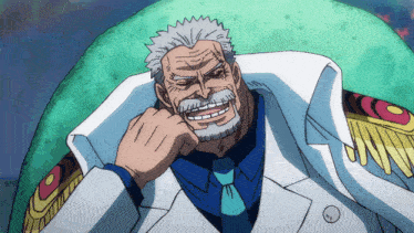 a man with gray hair and a beard is sitting in a chair