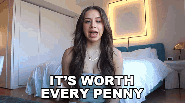 a woman says it 's worth every penny in a bedroom