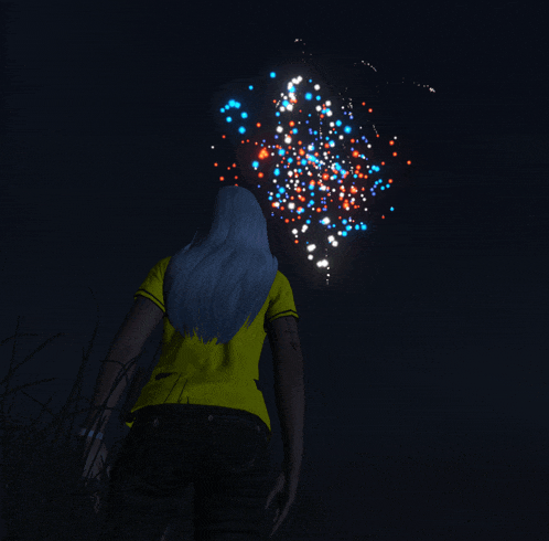 a woman in a yellow shirt is looking up at fireworks