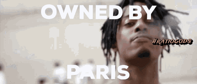 a man smoking a cigarette with the words " owned by paris " below him