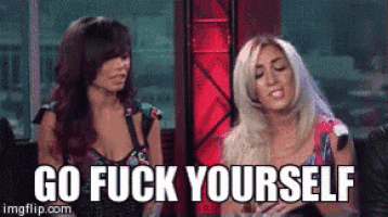 two women are sitting next to each other and the words go fuck yourself are on the screen