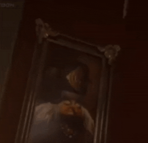 a cartoon character is looking at a framed painting
