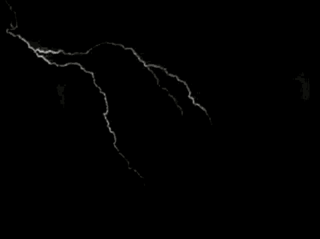 a black and white photo of lightning strikes in the sky