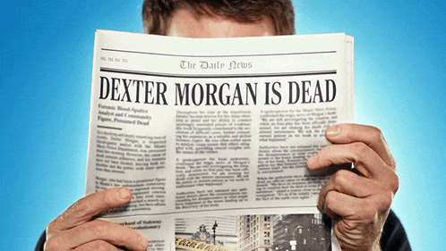 a man is reading a newspaper with the headline dexter morgan is dead