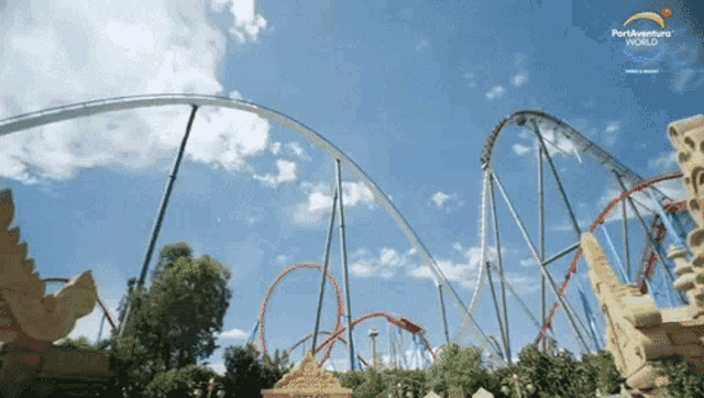 a roller coaster at portaventura world with a blue sky