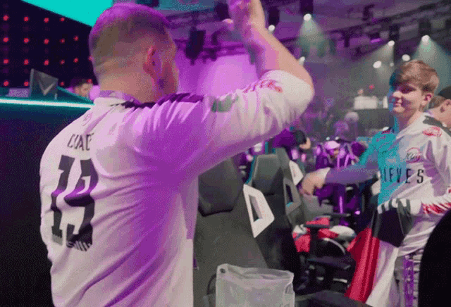 a man in a white shirt with the number 23 on it