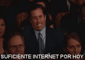 a man in a suit and tie is raising his hands in the air with the words suficiente internet por hoy behind him