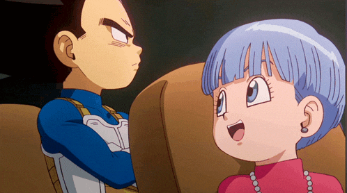 a boy and a girl are sitting next to each other
