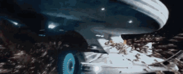 a close up of a car 's wheel with a circle on it