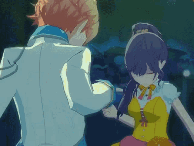 a man and a girl are dancing in a video game .