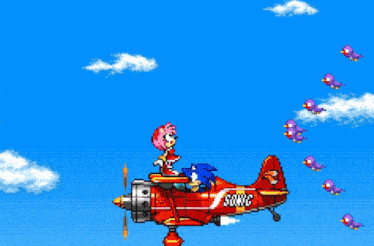 a sonic the hedgehog video game congratulates amy and sonic on their victory