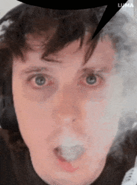 a close up of a man 's face with a speech bubble that says luma on it