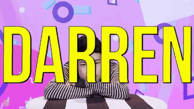 a person with their arms crossed and the name darren behind them