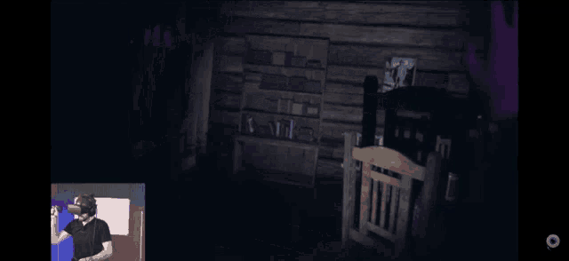 a man wearing a virtual reality headset plays a video game