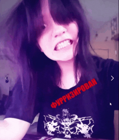a girl wearing a black shirt that says " furpm3mpobah " on it