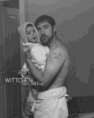 a shirtless man is holding a baby wrapped in a white towel with the words wittchen show and dad written on the bottom
