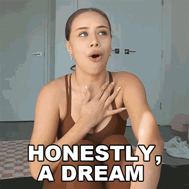 a woman with a surprised look on her face and the words honestly a dream behind her