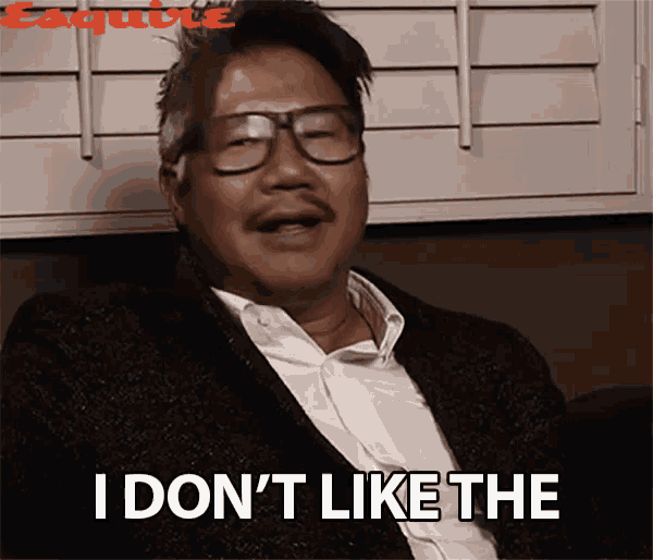 a man with glasses and a mustache is saying i don 't like the
