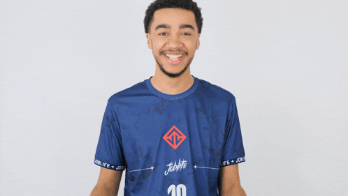 a man wearing a blue shirt with the number 10 on the front