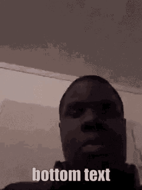 a man 's face is shown with the words " bottom text " written below it