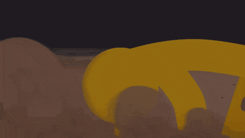 a yellow object is being struck by lightning