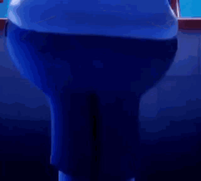 a close up of a cartoon character 's butt in a blue room .