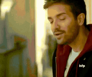 a blurry picture of a man with hfp written in the corner
