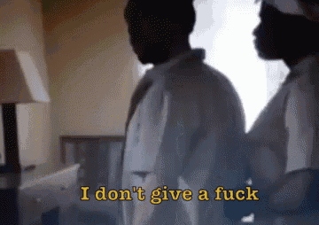 a man and a woman are standing next to each other and the man is saying i don 't give a fuck