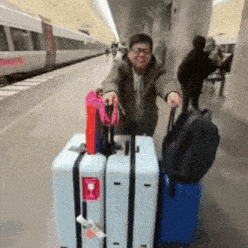 a man is pulling a suitcase with a tag that says ' sydney ' on it